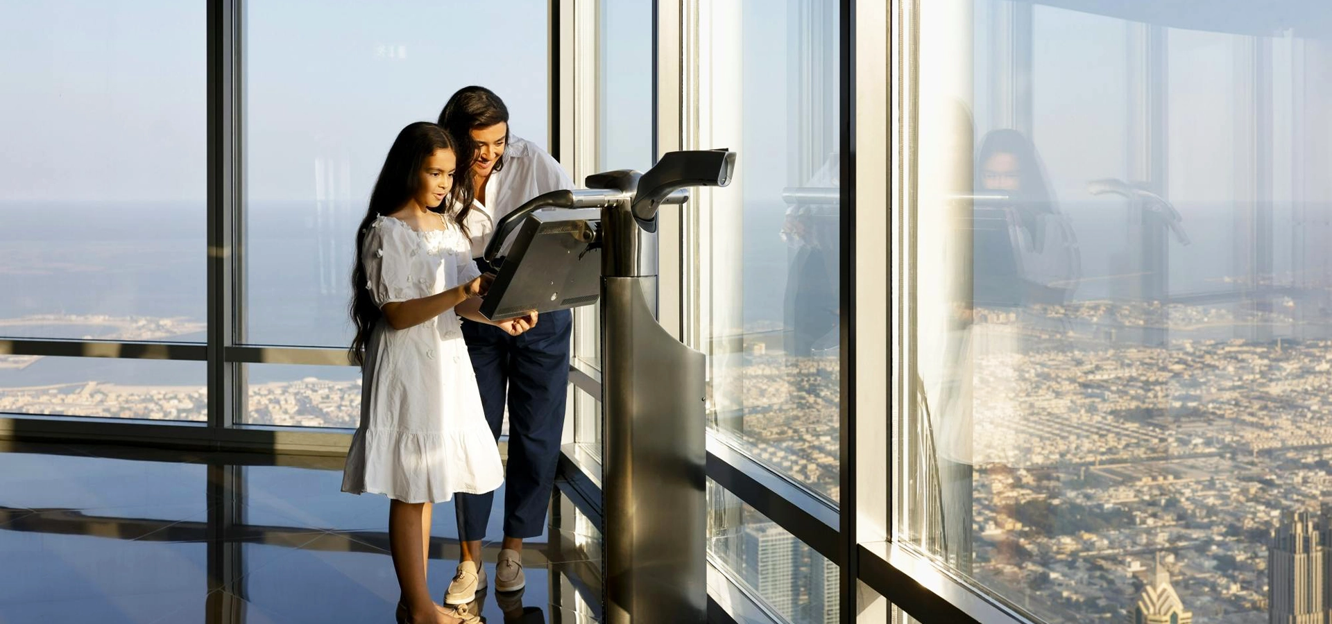 View from the observation deck of the Burj Khalifa overlooking Downtown Dubai and the Fountain.
