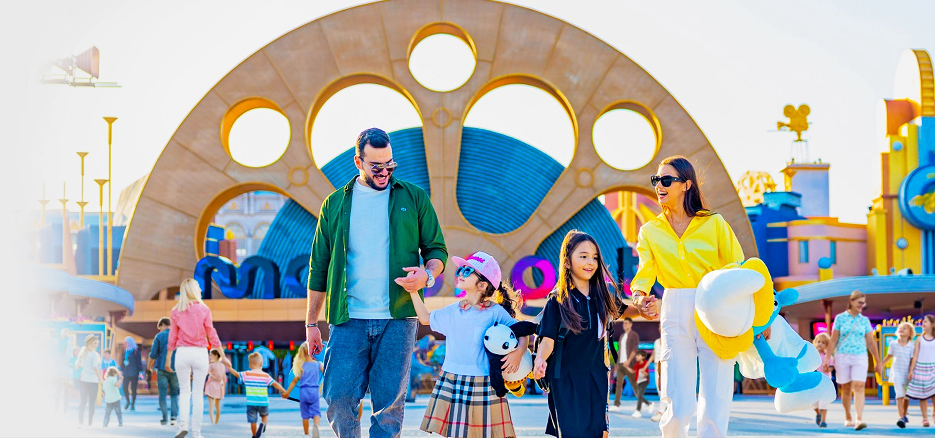 Family enjoying Dubai Parks and Resorts Motiongate, Legoland, and Real Madrid World