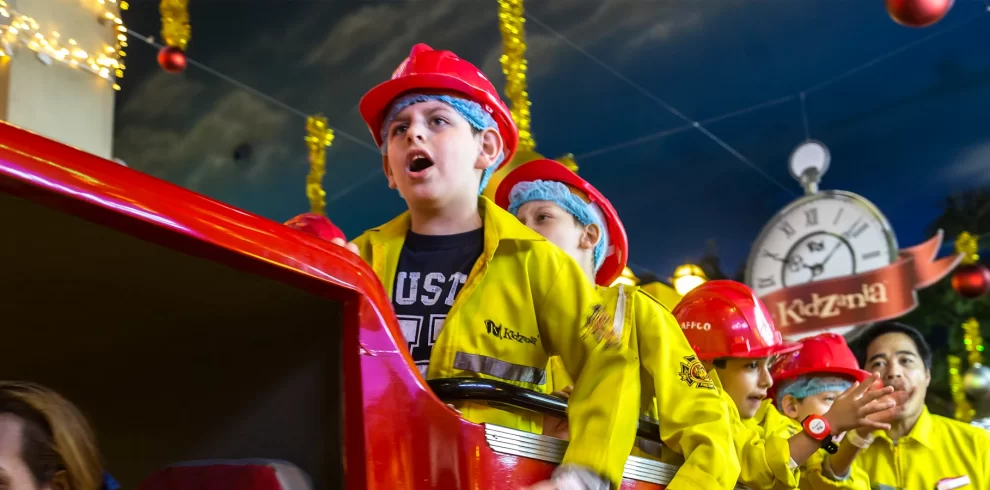 Children exploring KidZania Dubai at The Dubai Mall interactive city for kids.